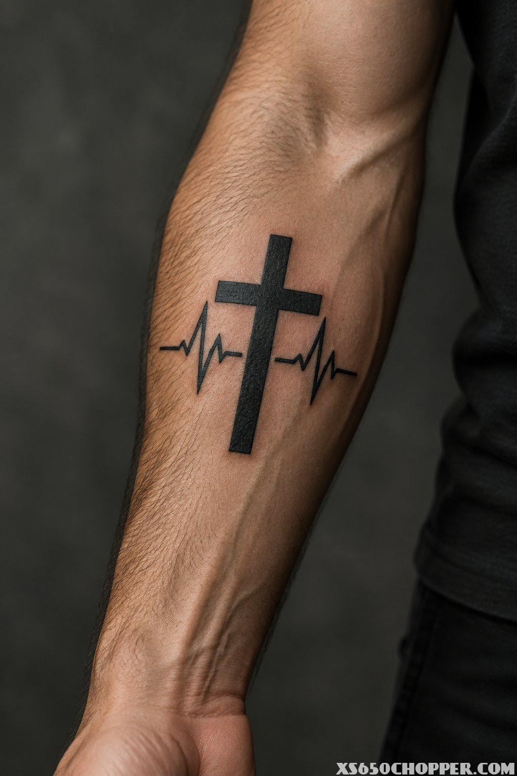 A man’s forearm featuring a bold cross tattoo combined with a heartbeat line.