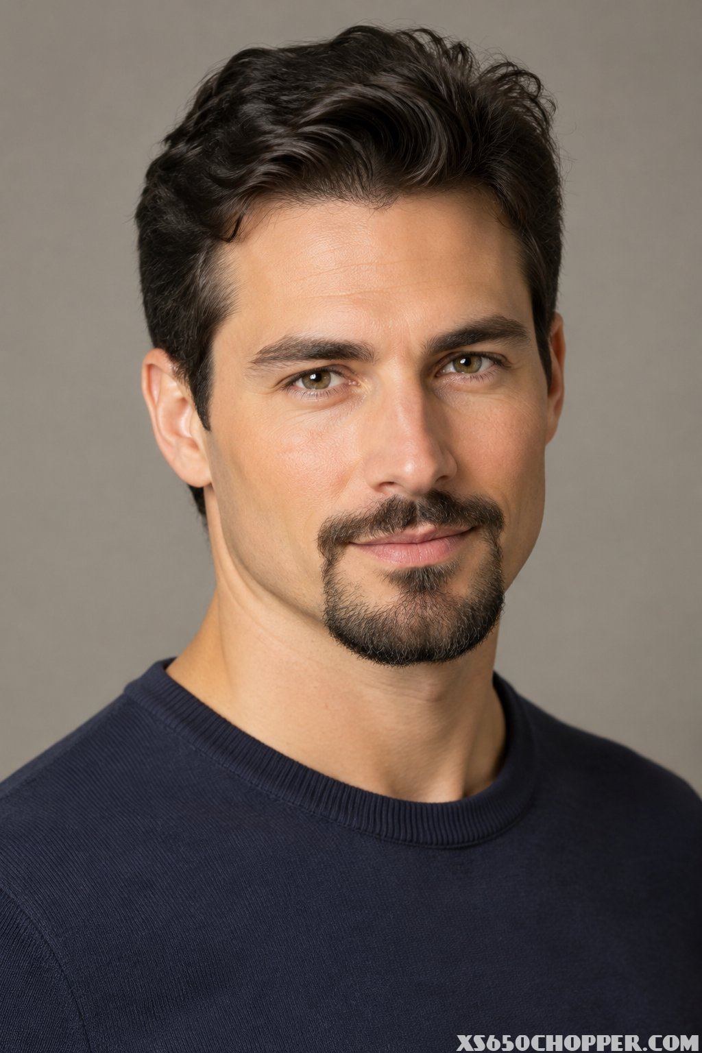 A man with a neatly trimmed goatee.