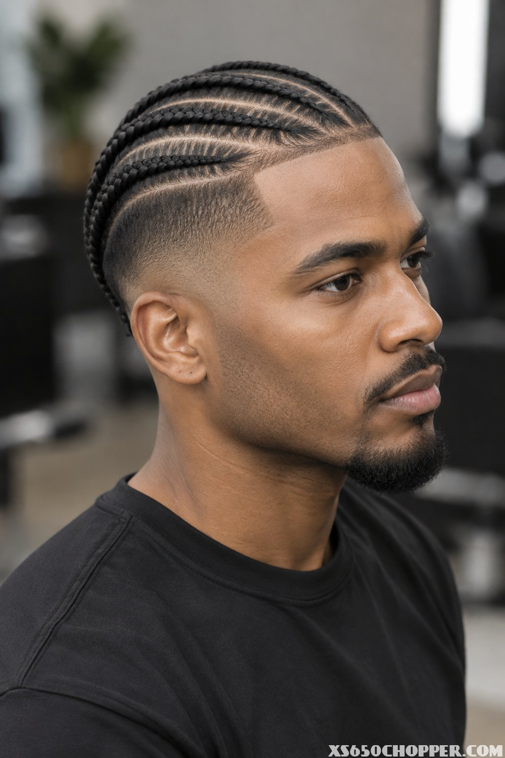 A man with braided hair.