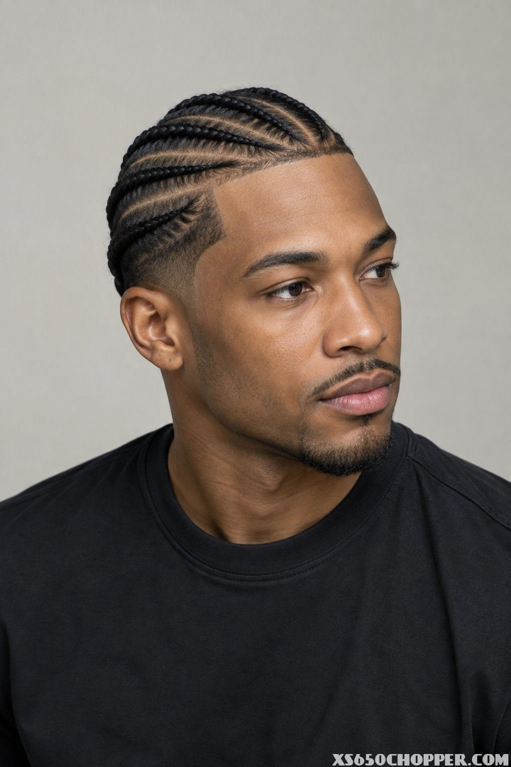 A man poses for a portrait.
